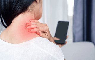 woman suffering from neck , shoulder pain using mobile phone too long with bad posture (1)